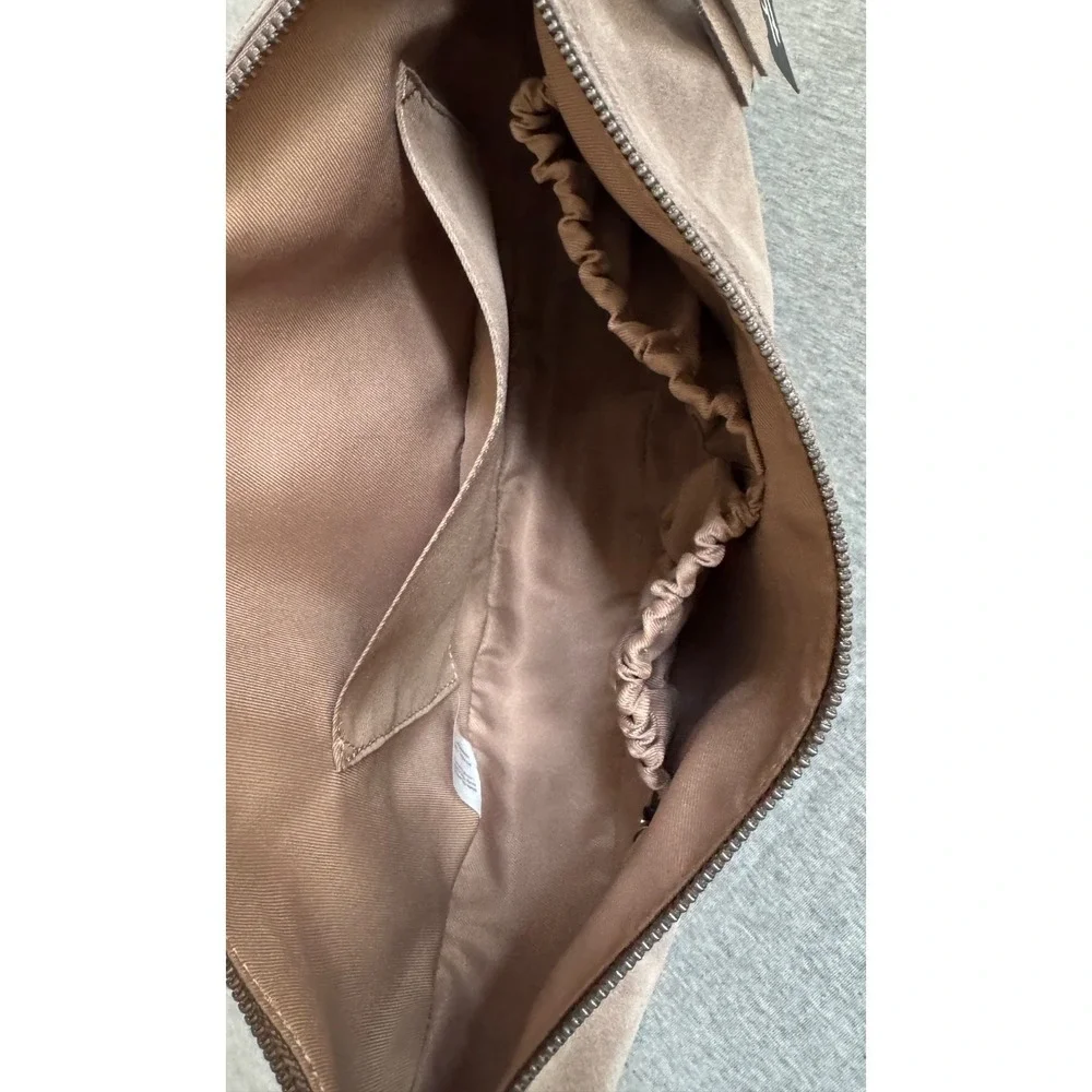 The Sak Suede Saddle Crossbody Bag in Taupe Brown